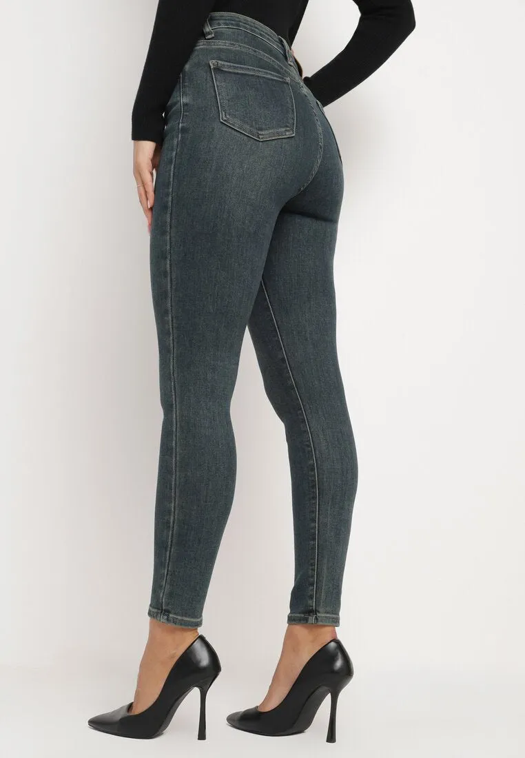 Jean slim bleu foncé délavée et taille haute