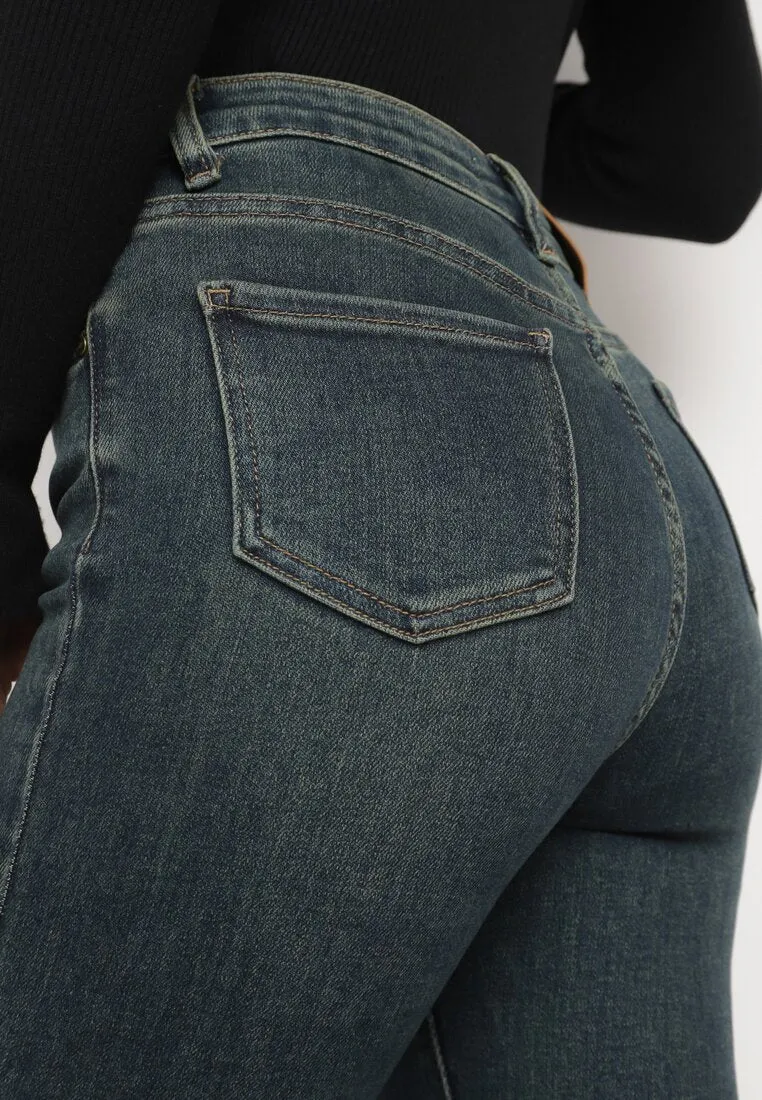 Jean slim bleu foncé délavée et taille haute