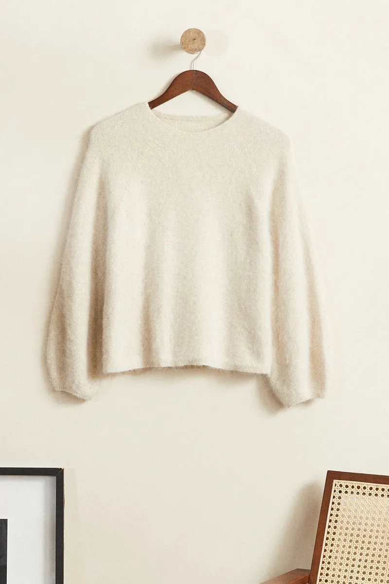 Pull court angora beige