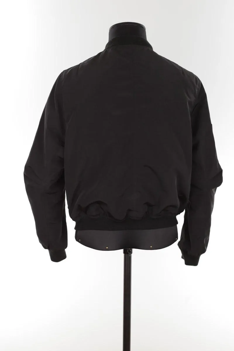 Veste noir Claudie Pierlot noir. Matière principale polyester. Taille 36.